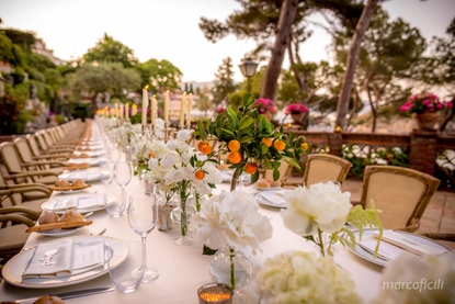 Wedding reception Imperial table with mini kumquat trees, white peonies and roses at Belmond Villa Sant`Andrea Taormina Mare