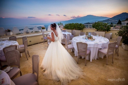 Wedding photography - Taormina rooftop reception with magnificent Mount Etna at sunset