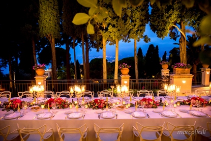 Imperial table with colourful flower arrangements and silver candelabras at Belmond Grand Hotel Timeo Taormina