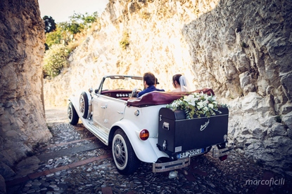 Vintage Beauford bridal car for location photos in Taormina after the wedding ceremony