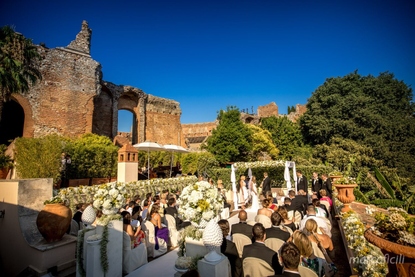 Blessing ceremony right alongside the evocative ruins of the ancient Greek Theatre of Taormina