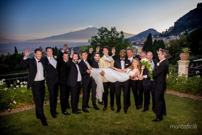 Fun wedding photography as the sun goes down at Belmond Grand Hotel Timeo Taormina