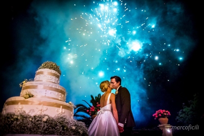 Fireworks with the wedding cake light up the sky at Belmond Grand Hotel Timeo Taormina