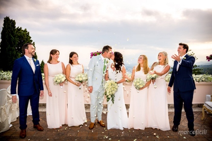 Just Married - petal tossing and well wishes from the bridal party