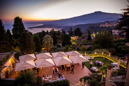 Mount Etna at Sunset - Stunning backdrop to wedding reception cocktail aperitif on Ganimede Terrace at Belmond Grand Hotel Timeo