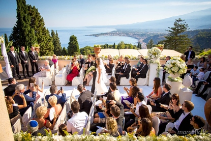 Wedding ceremony outdoors on the stunning Greek Theatre Terrace at Belmond Grand Hotel Timeo Taormina
