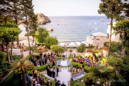 Jewish wedding blessing 'en plein air' by the sea at Belmond Villa Sant`Andrea Taormina Mare